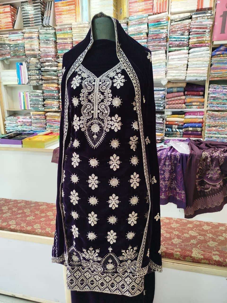 Embroidered velvet suit with dupatta on display at Shahzad Cloth House